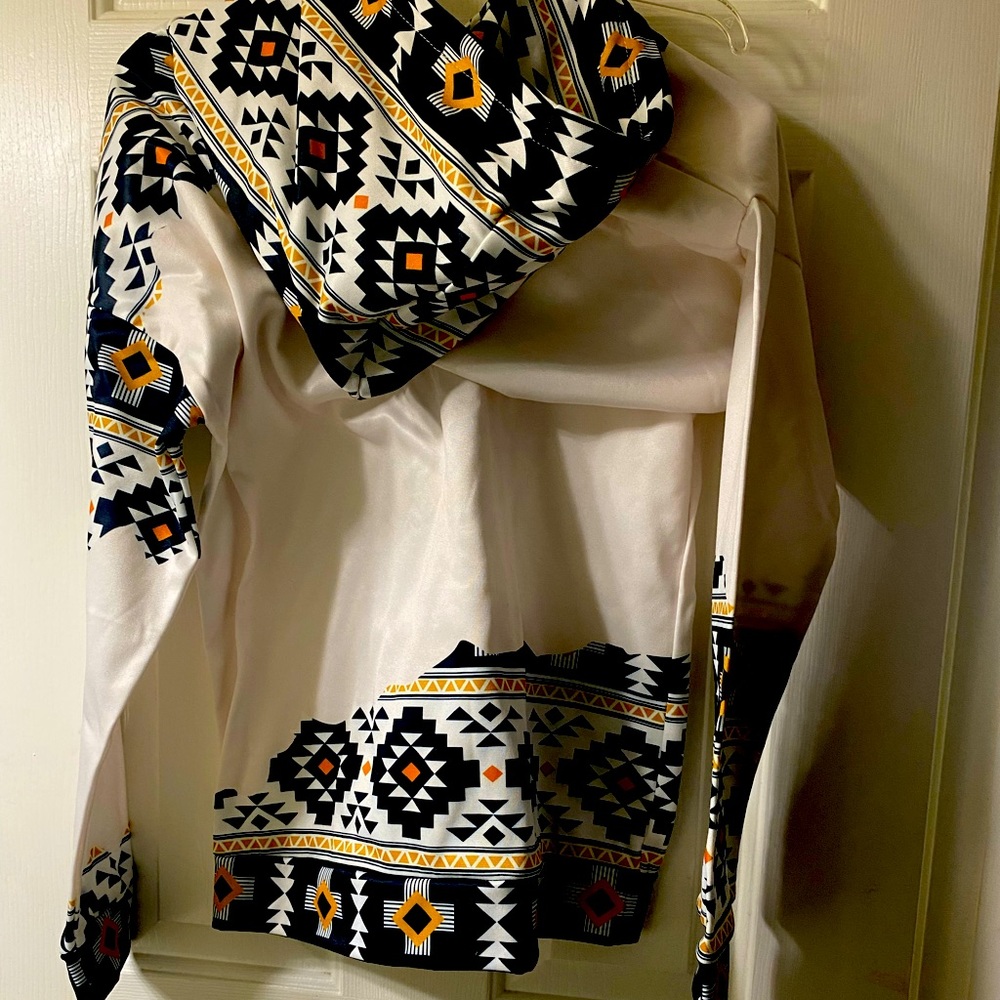 Mustard, black and cream hoodie. Fuzzy inside. Never worn.